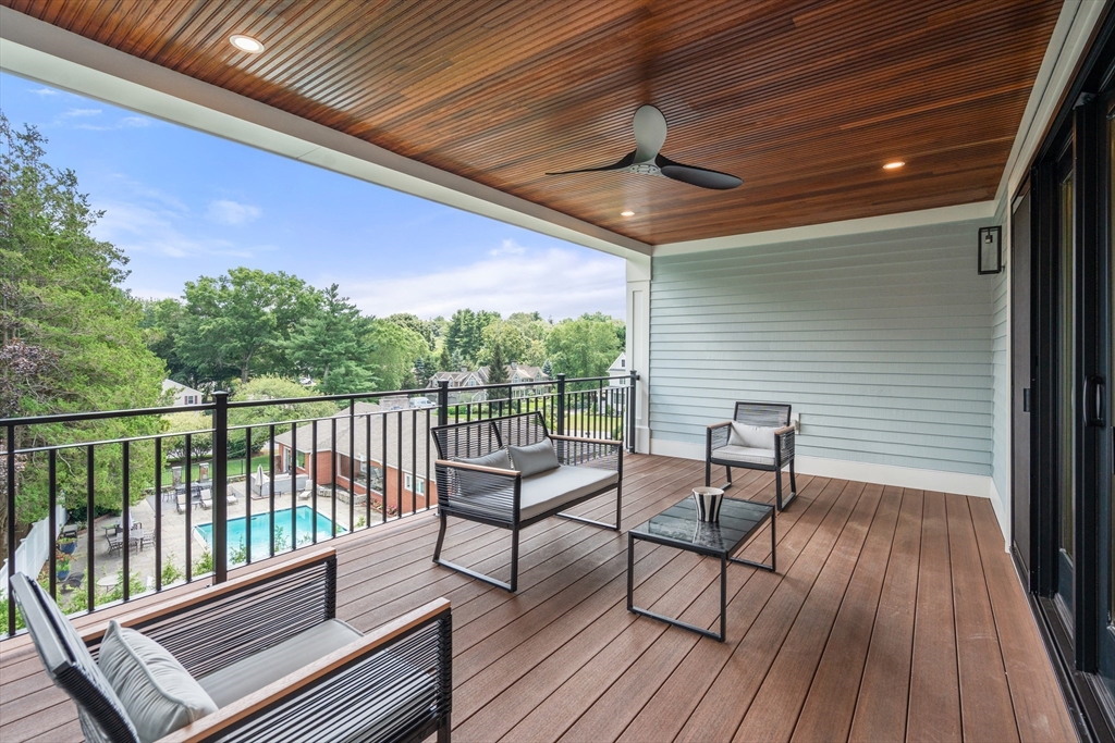 53 Crestview Road Belmont, MA 02478 - Photo 27 of 42 a view of a two chairs in the balcony