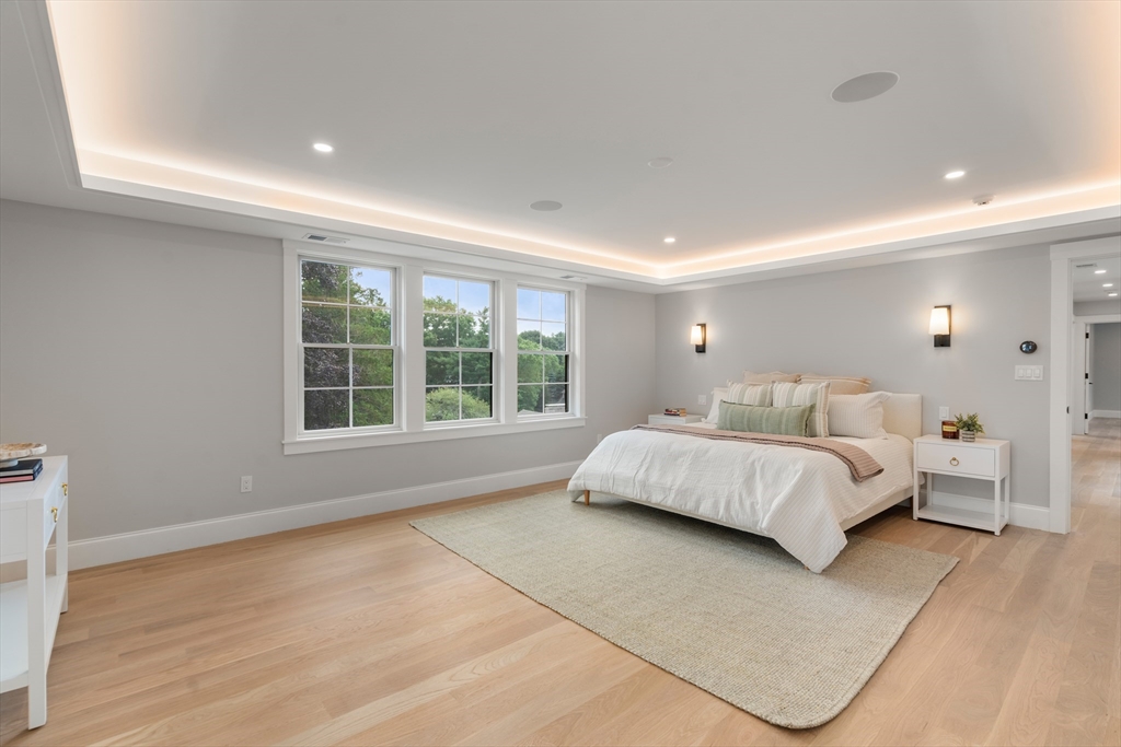 53 Crestview Road Belmont, MA 02478 - Photo 29 of 42 a spacious bedroom with a bed and a large window