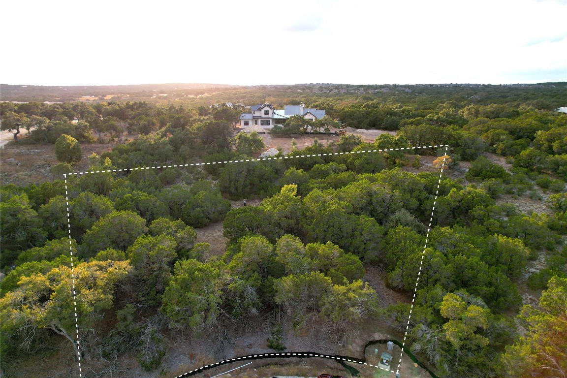0 Broadwing Cove Austin, TX 78737 - Photo 2 of 15 a view of a city with lush green forest
