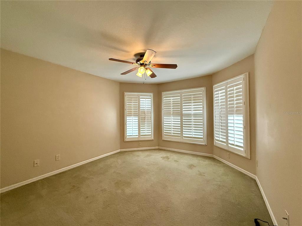 15235 Southwest 14th Avenue Road Ocala, FL 34473 - Photo 26 of 52 a view of an empty room with a window