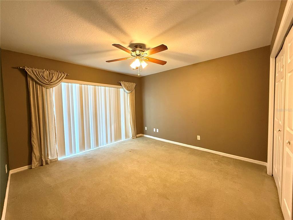 15235 Southwest 14th Avenue Road Ocala, FL 34473 - Photo 28 of 52 a view of an empty room with a window