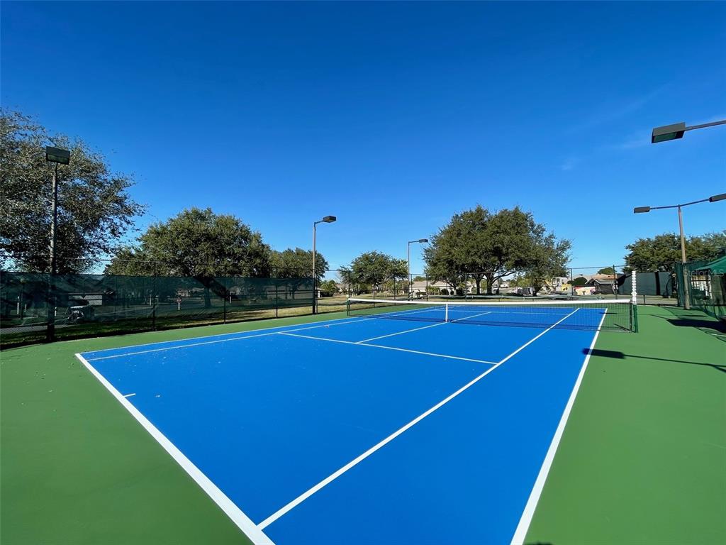 15235 Southwest 14th Avenue Road Ocala, FL 34473 - Photo 49 of 52 a view of a tennis court