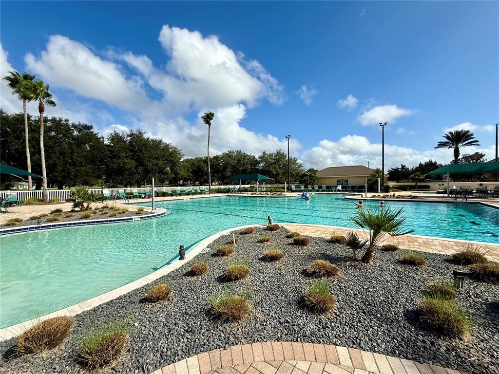 15235 Southwest 14th Avenue Road Ocala, FL 34473 - Photo 52 of 52 a view of a lake with houses in the back