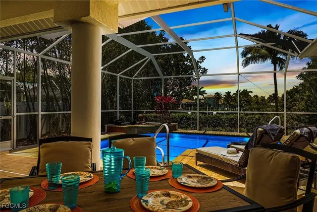 a view of a chairs and table on the deck