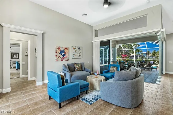a living room with furniture and a window