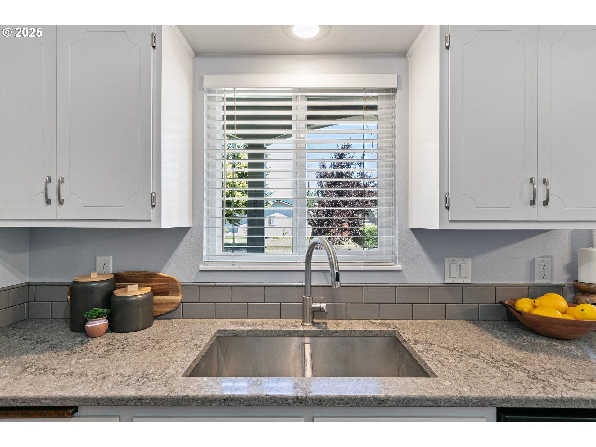 2378 11th Street Springfield, OR 97477 - Photo 12 of 38 a kitchen with a sink and cabinets