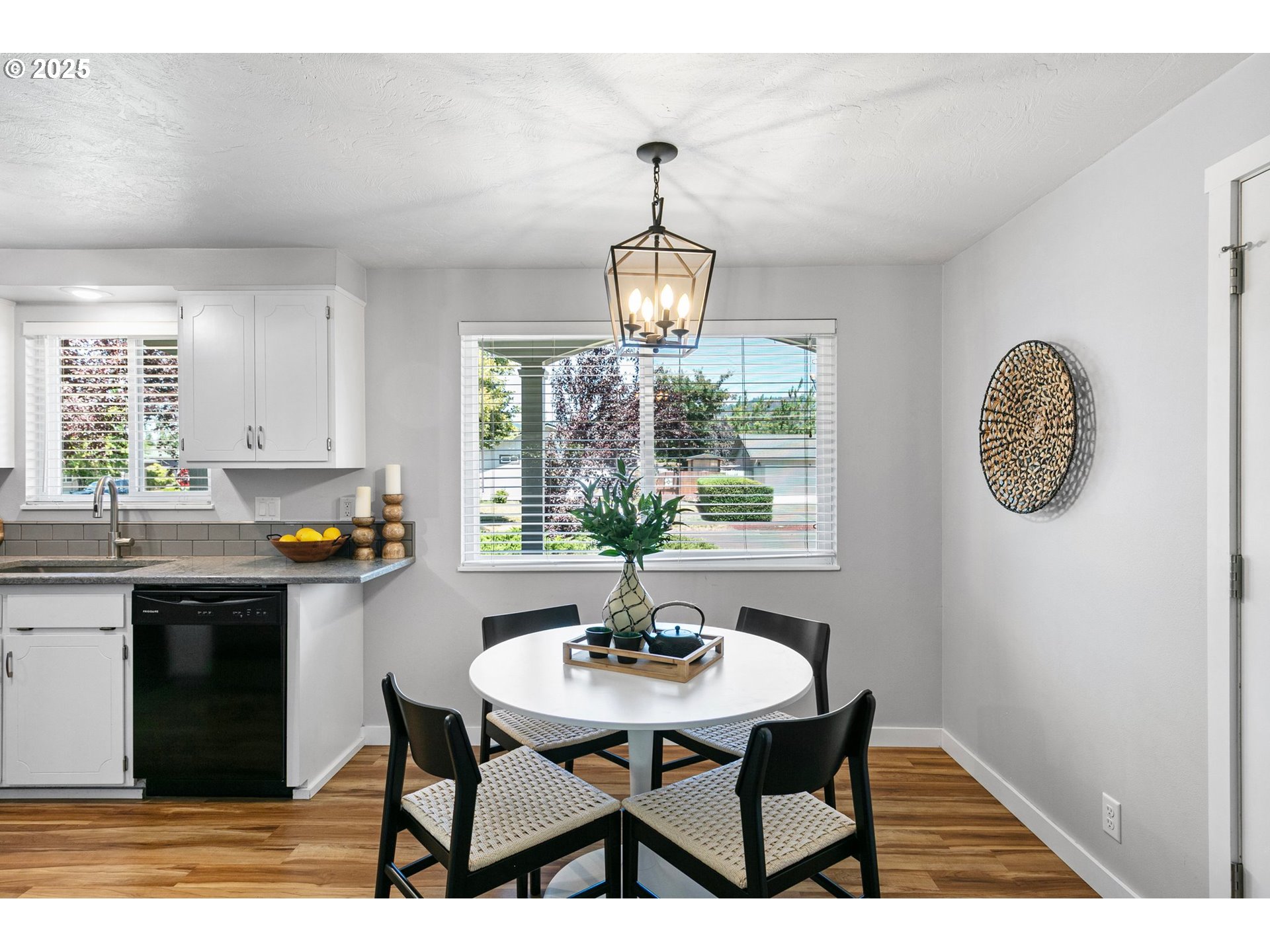 2378 11th Street Springfield, OR 97477 - Photo 14 of 38 a kitchen with a table and chairs in it