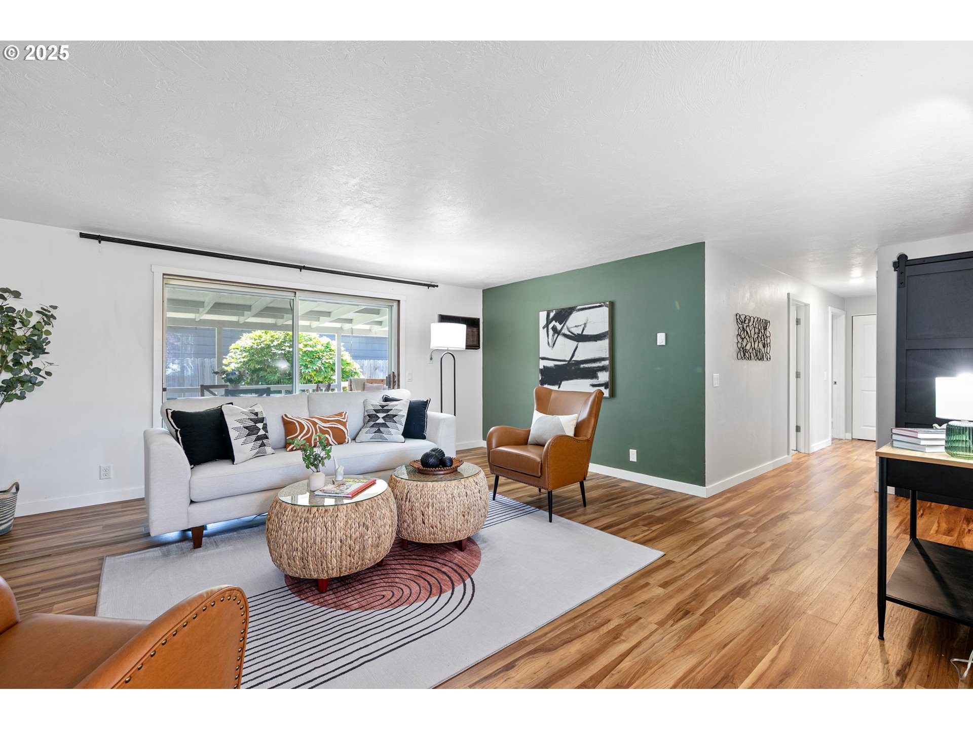 2378 11th Street Springfield, OR 97477 - Photo 16 of 38 a living room with furniture and a large window