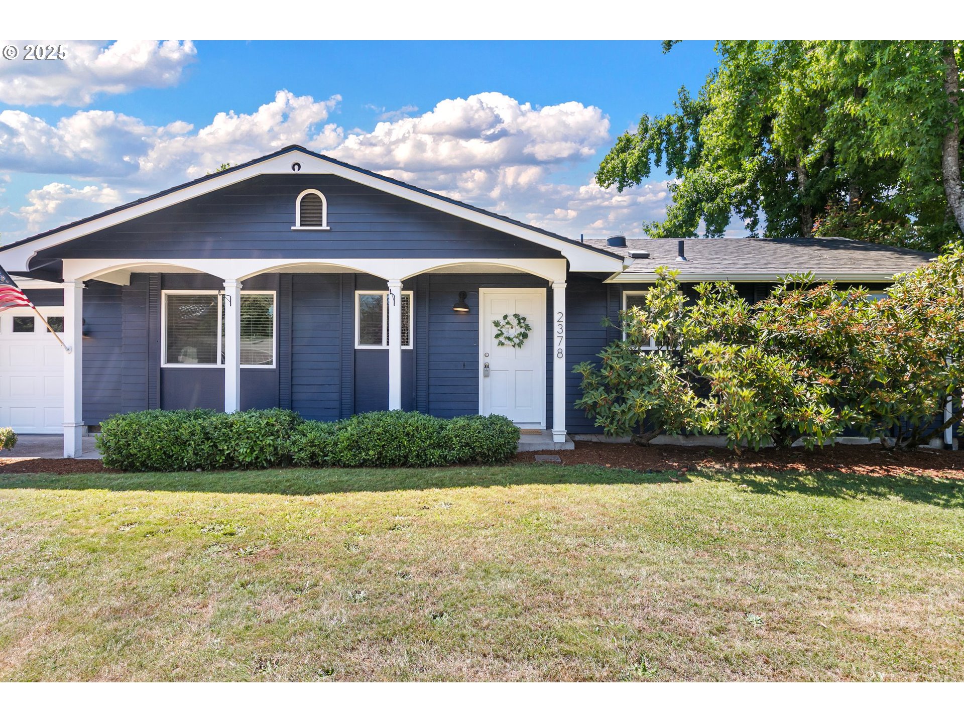 2378 11th Street Springfield, OR 97477 - Photo 2 of 38 a front view of a house with garden