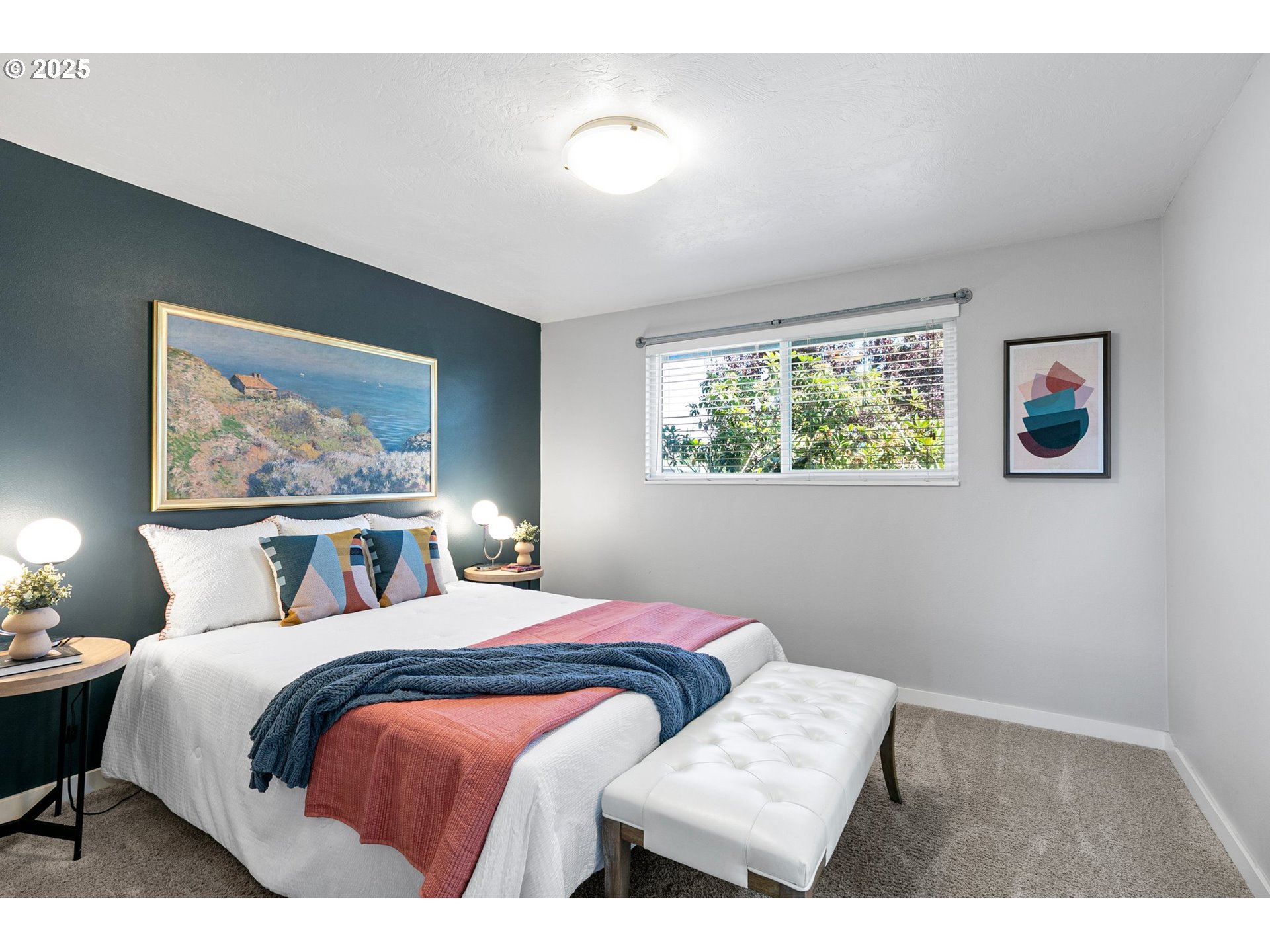 2378 11th Street Springfield, OR 97477 - Photo 25 of 38 a bedroom with a bed and a painting on the wall