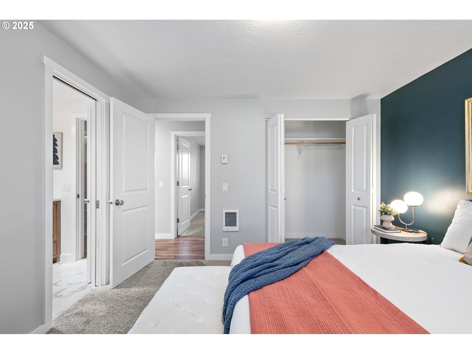 2378 11th Street Springfield, OR 97477 - Photo 26 of 38 a bedroom with a bed and a lamp