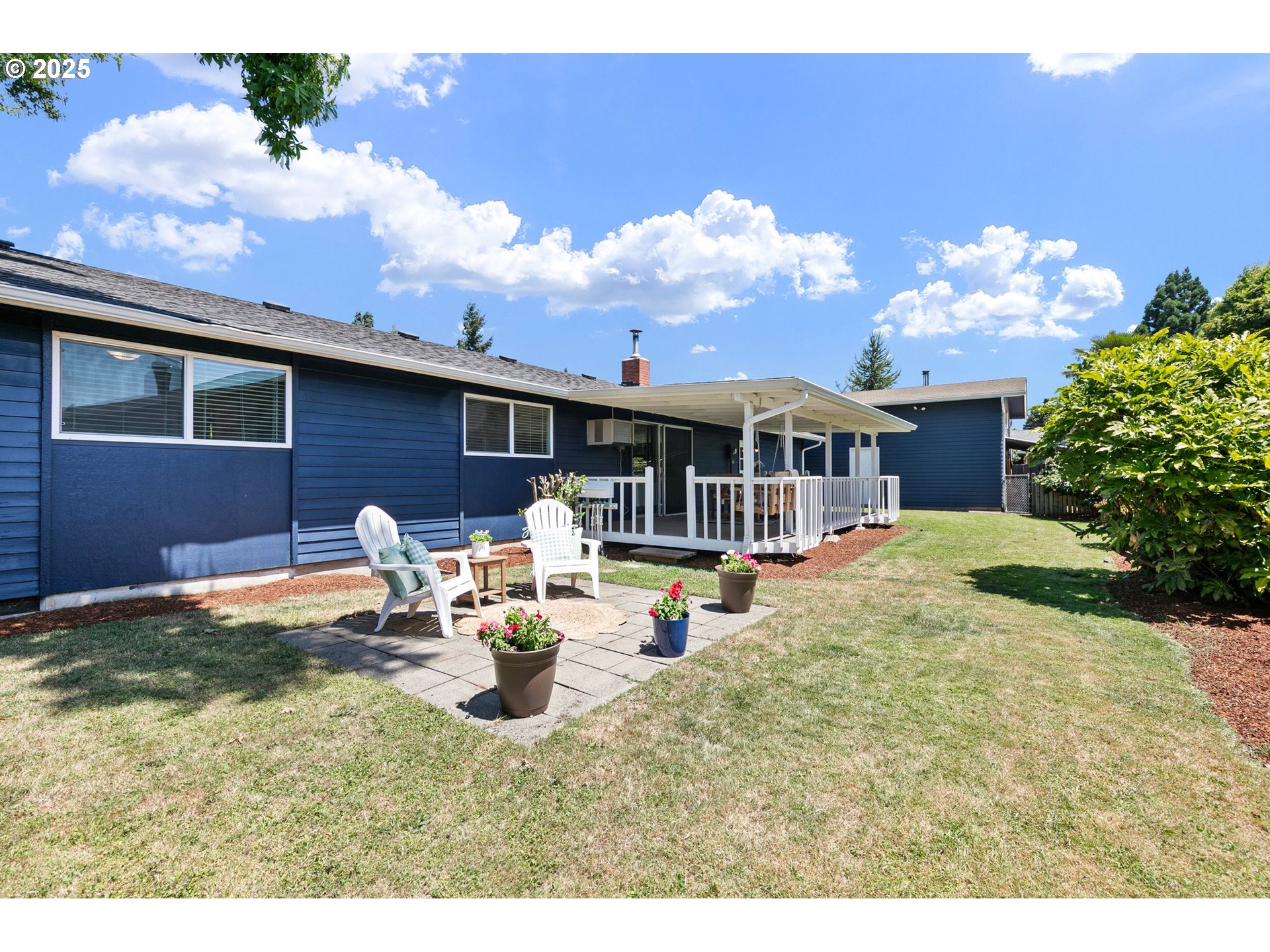 2378 11th Street Springfield, OR 97477 - Photo 29 of 38 a view of a house with backyard porch and sitting area