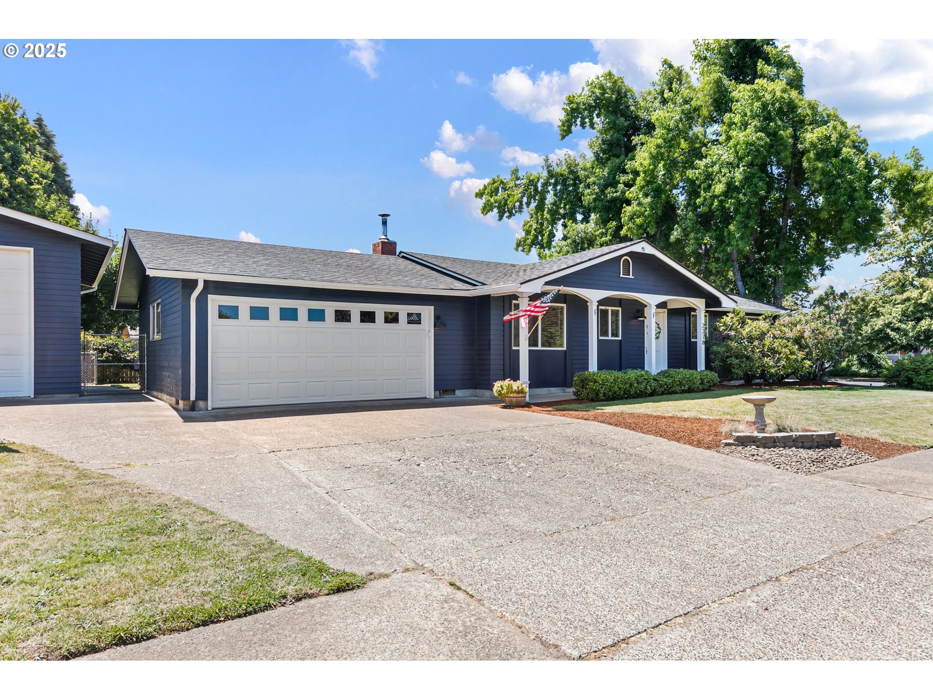 2378 11th Street Springfield, OR 97477 - Photo 3 of 38 a front view of a house with a yard