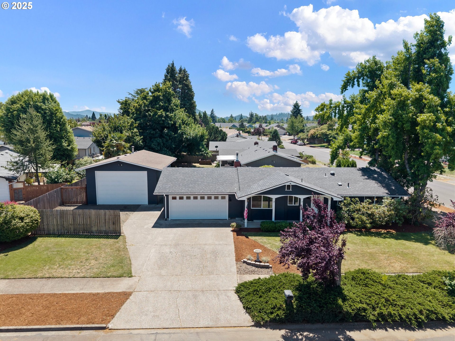 2378 11th Street Springfield, OR 97477 - Photo 4 of 38 a front view of a house with garden