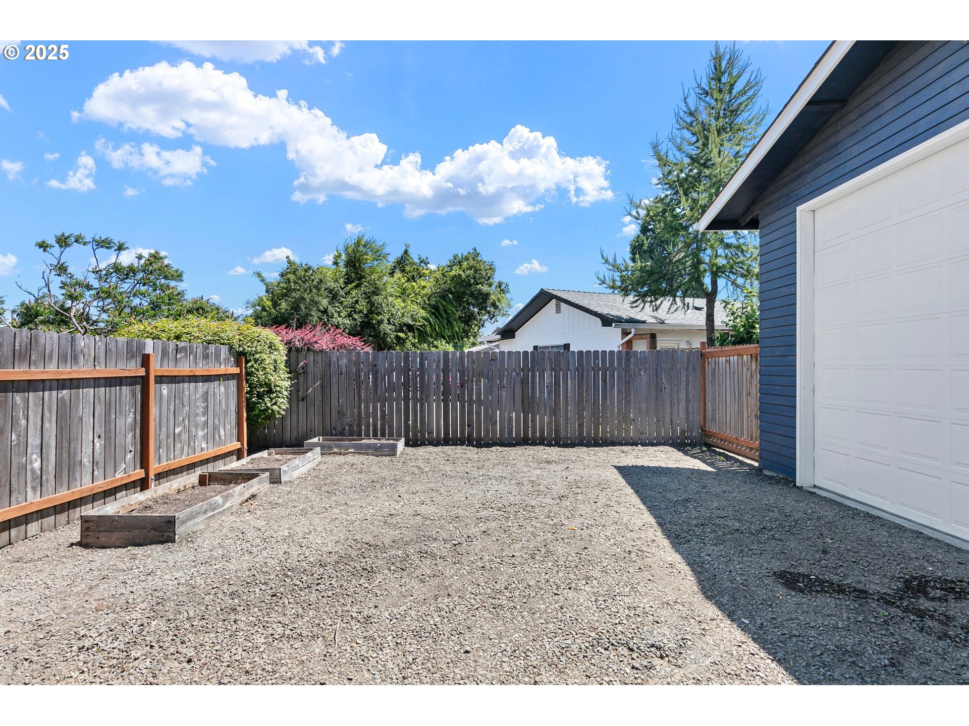 2378 11th Street Springfield, OR 97477 - Photo 7 of 38 a backyard of a house with lots of green space