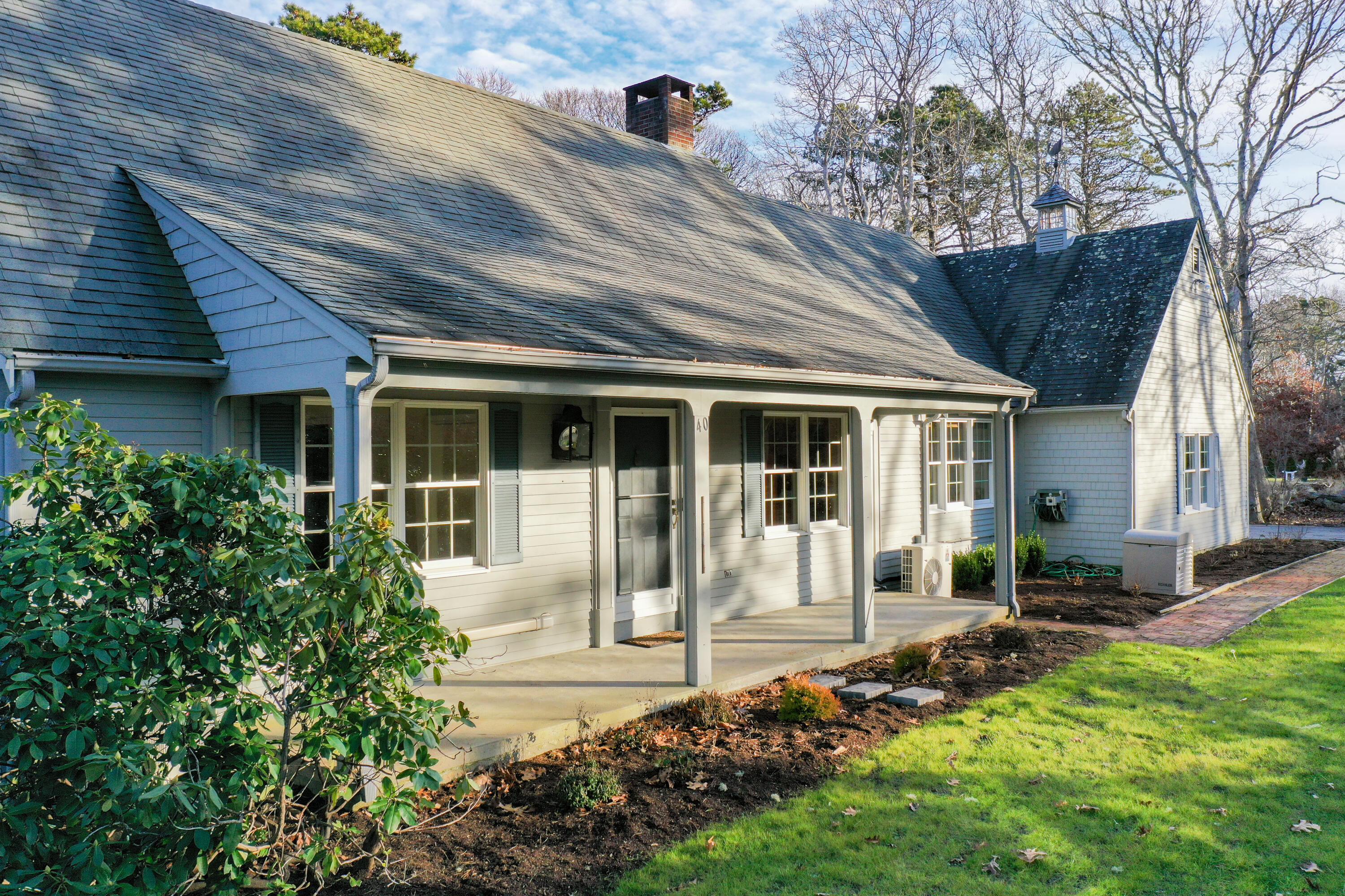 front view of a house with a yard