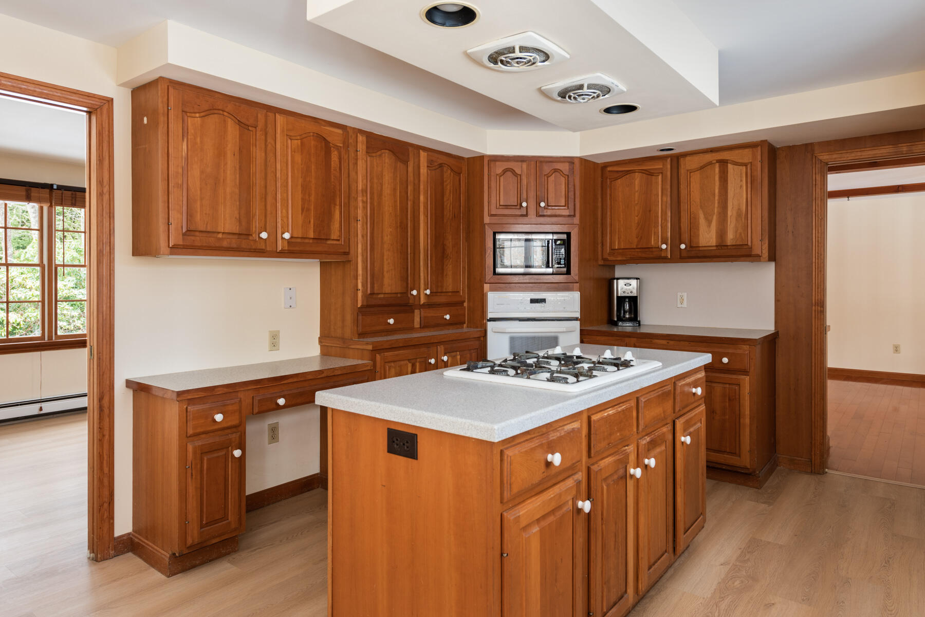 40 Baldwin Road Eastham, MA 02642 - Photo 23 of 37 a kitchen with a stove and a refrigerator
