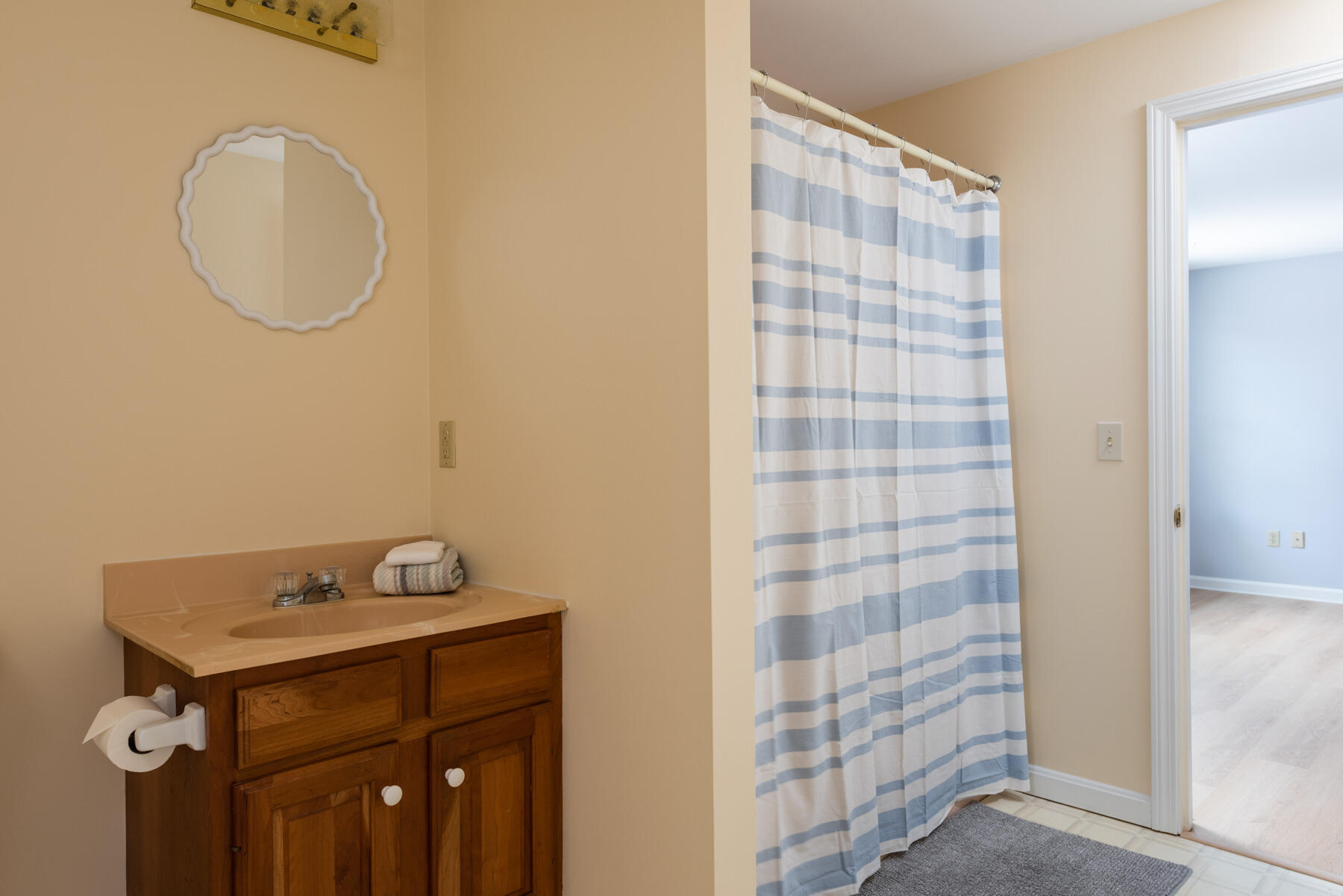 40 Baldwin Road Eastham, MA 02642 - Photo 31 of 37 a bathroom with a sink and a mirror