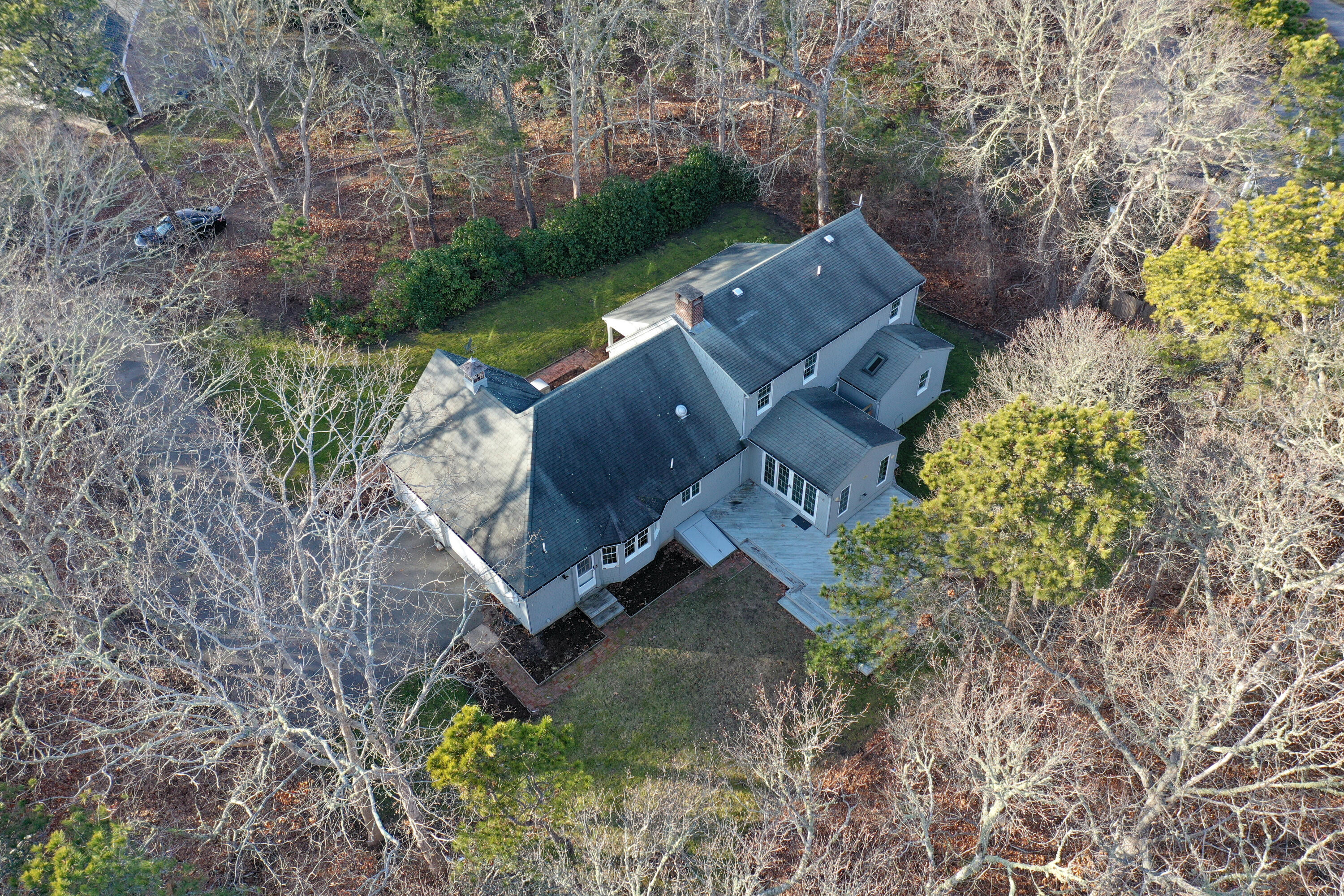 40 Baldwin Road Eastham, MA 02642 - Photo 4 of 37 an aerial view of a house with a yard