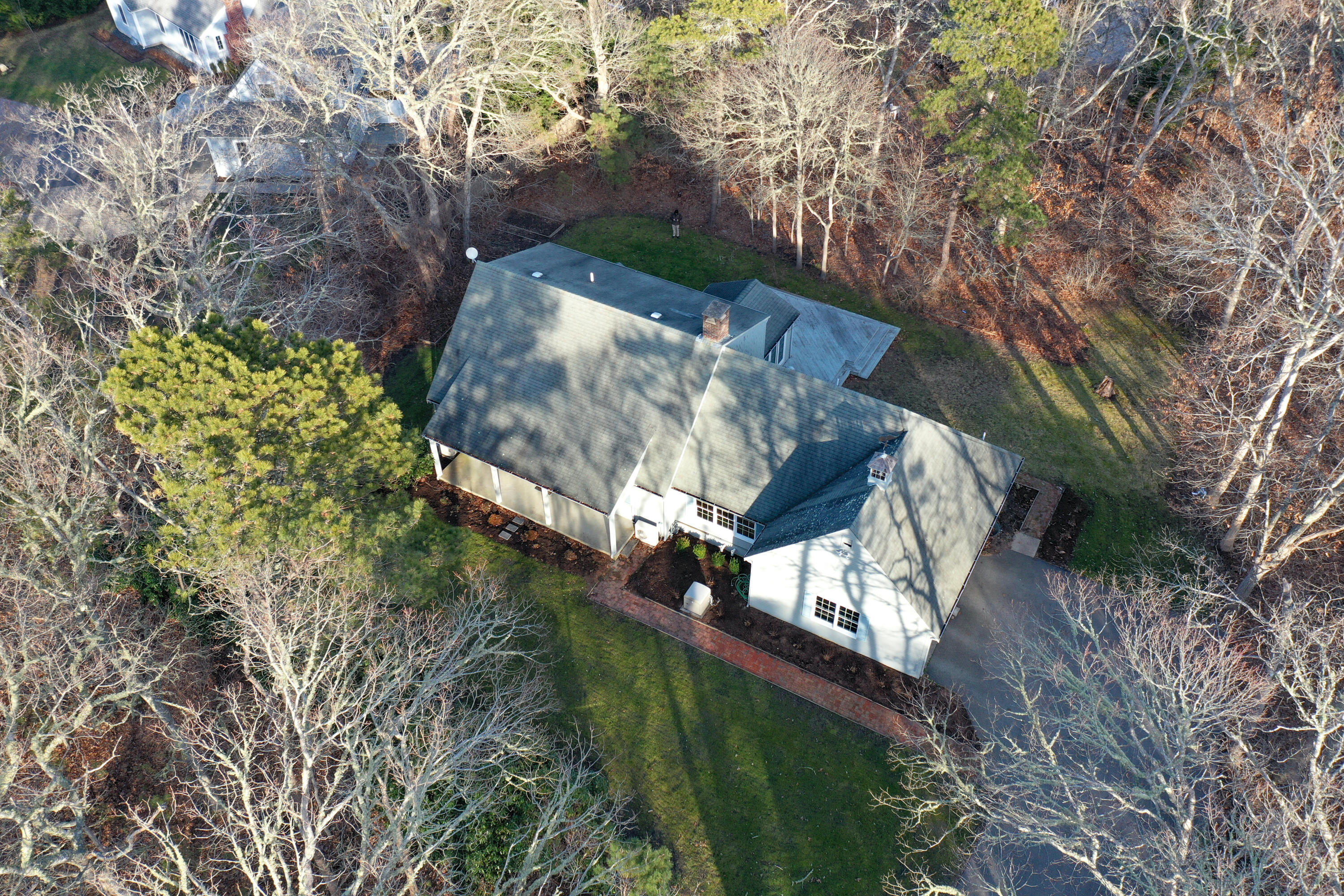40 Baldwin Road Eastham, MA 02642 - Photo 9 of 37 a view of a fireplace in a yard