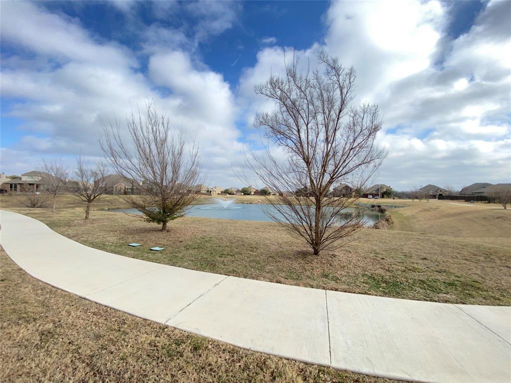 9645 Alderleaf Trail Crowley, TX 76036 - Photo 29 of 33 a view of a house with a yard
