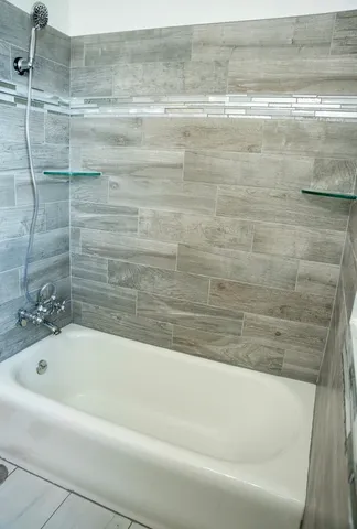 a bathroom with a bathtub