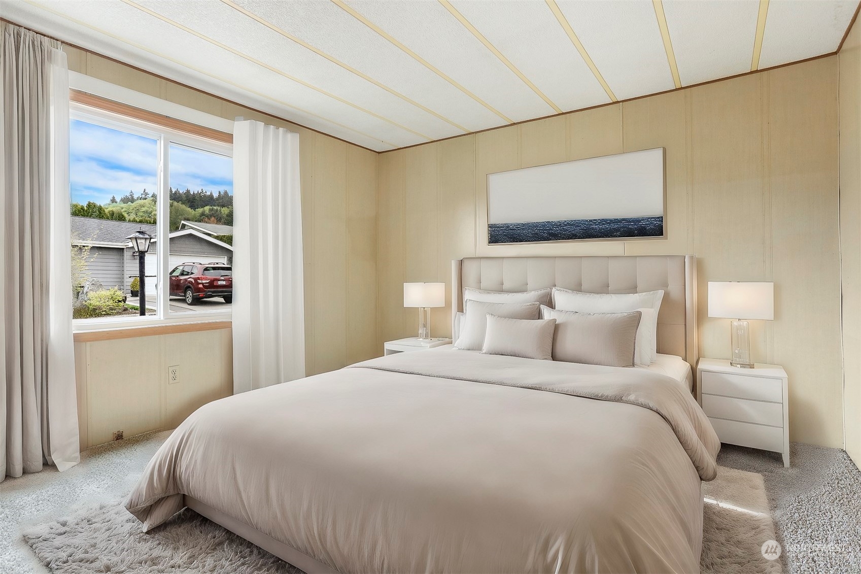 828 Wandering Creek Drive Bothell, WA 98021 - Photo 20 of 40 a bedroom with a bed and a window