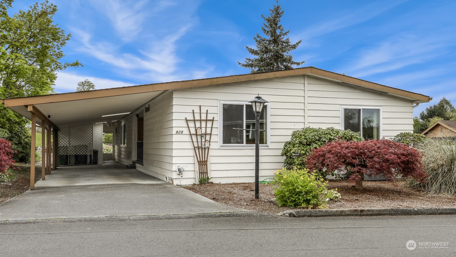 828 Wandering Creek Drive Bothell, WA 98021 - Photo 2 of 40 a house view with a outdoor space