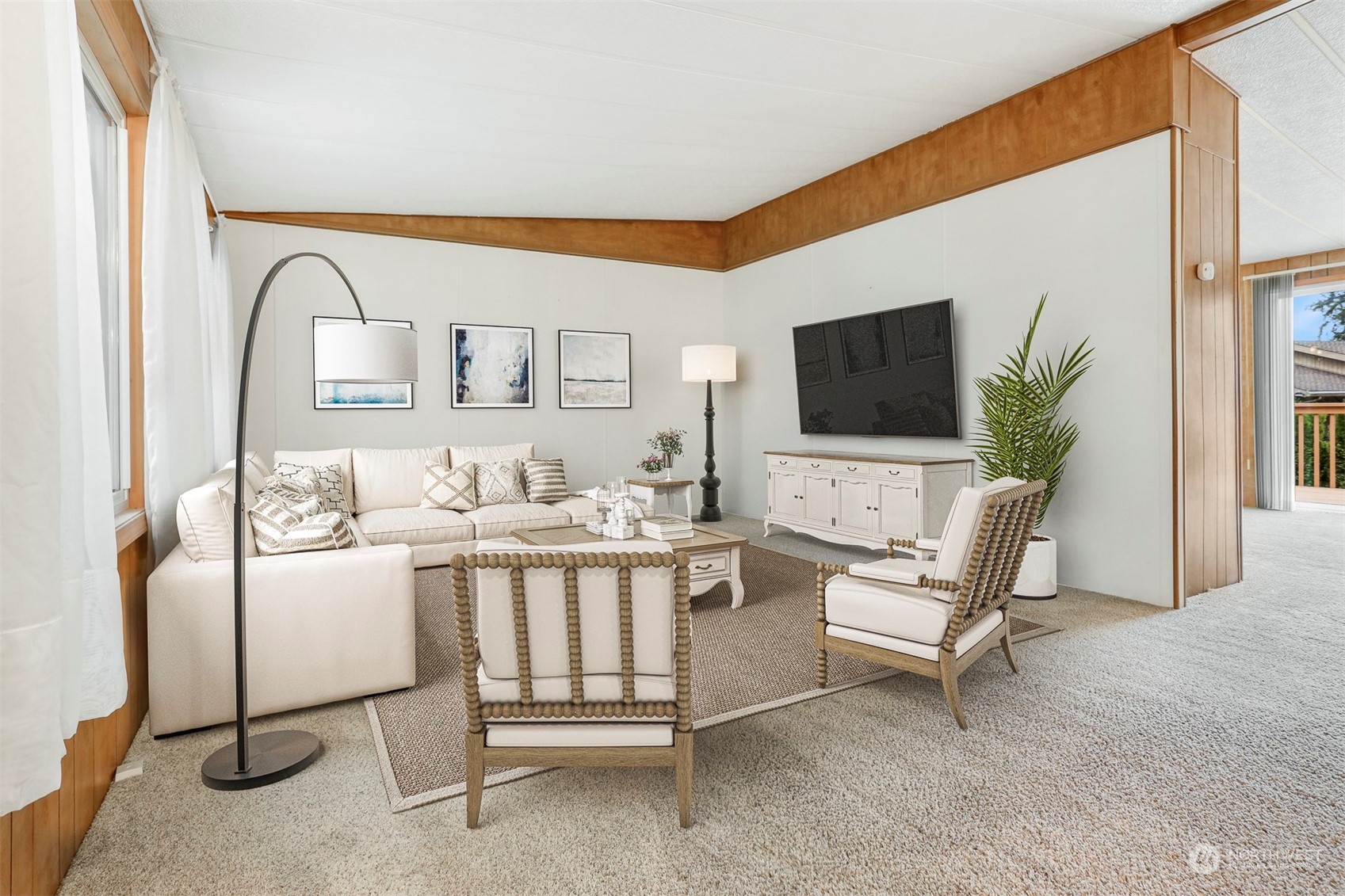 828 Wandering Creek Drive Bothell, WA 98021 - Photo 9 of 40 a living room with furniture and a flat screen tv