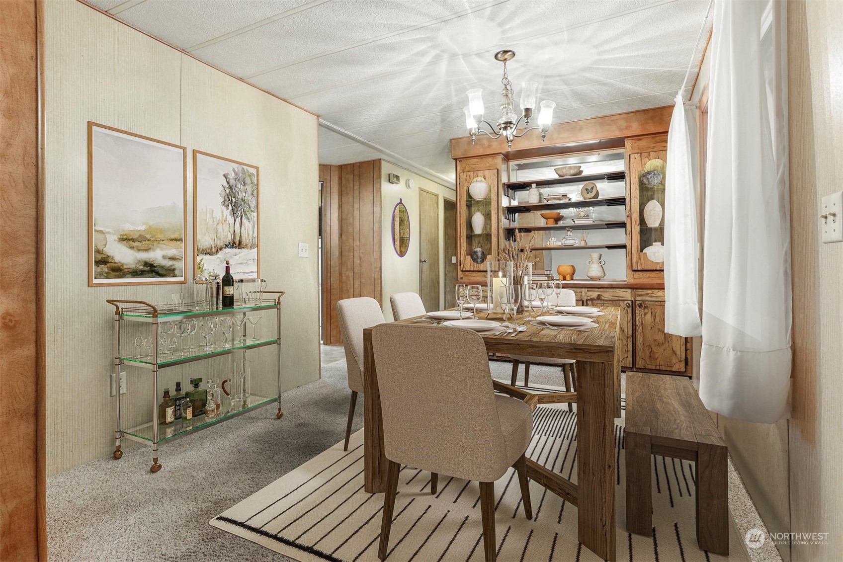828 Wandering Creek Drive Bothell, WA 98021 - Photo 10 of 40 a dining room with furniture and window