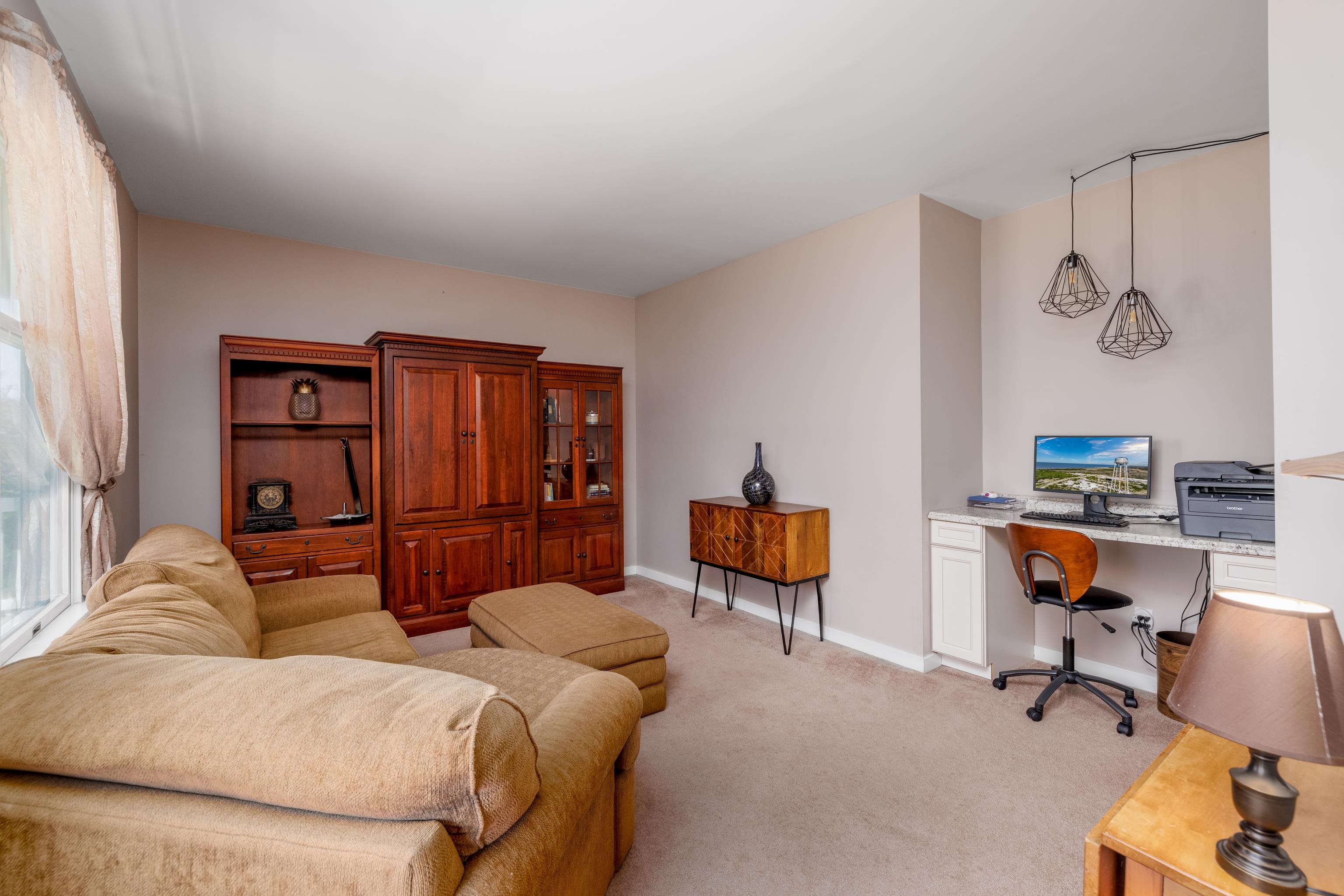 897 Weeks Landing Road Erma, NJ 08204 - Photo 8 of 48 a living room with furniture a lamp and a window