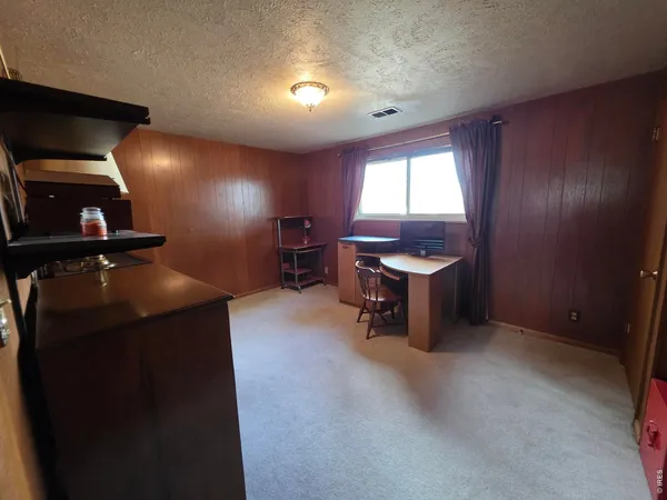 a room with furniture and window