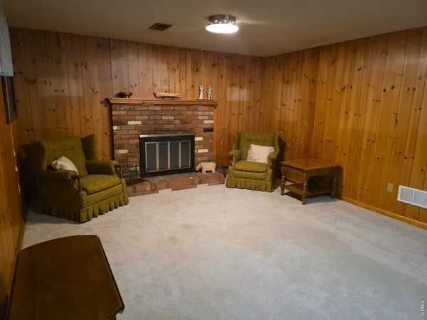 a view of a livingroom with furniture and furniture