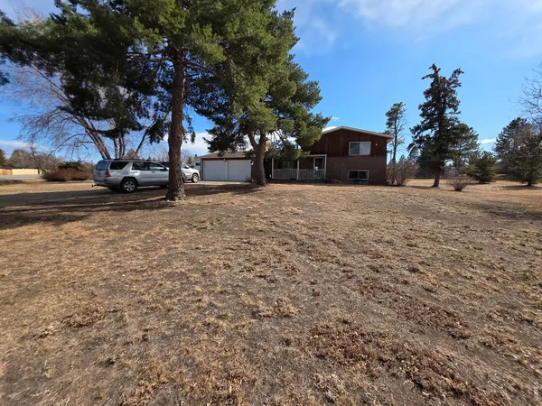 a view of house with outdoor space