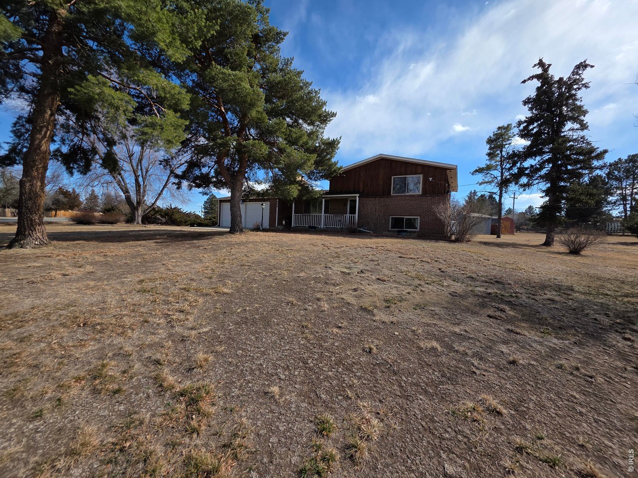 8840 Niwot Road Niwot, CO 80503 - Photo 33 of 34 a front view of a house with a yard