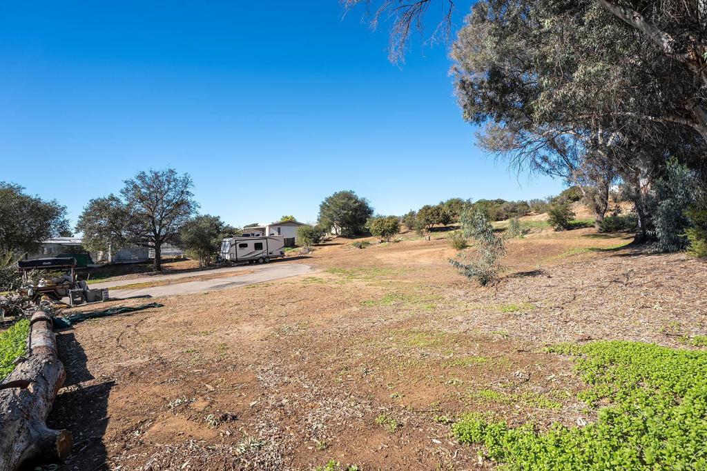 2560-66 Alpine Boulevard Alpine, CA 91901 - Photo 25 of 32 a view of a yard with snow on the road