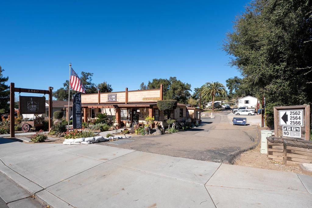 2560-66 Alpine Boulevard Alpine, CA 91901 - Photo 5 of 32 a outdoor view of a building with traffic signal lights