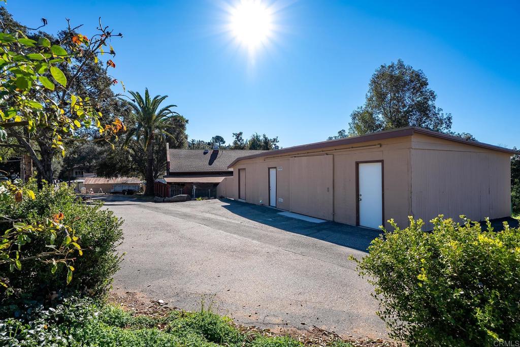 2560-66 Alpine Boulevard Alpine, CA 91901 - Photo 10 of 32 a backyard of a house with lots of green space