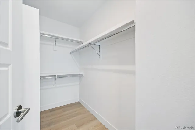 a view of an empty walk in closet
