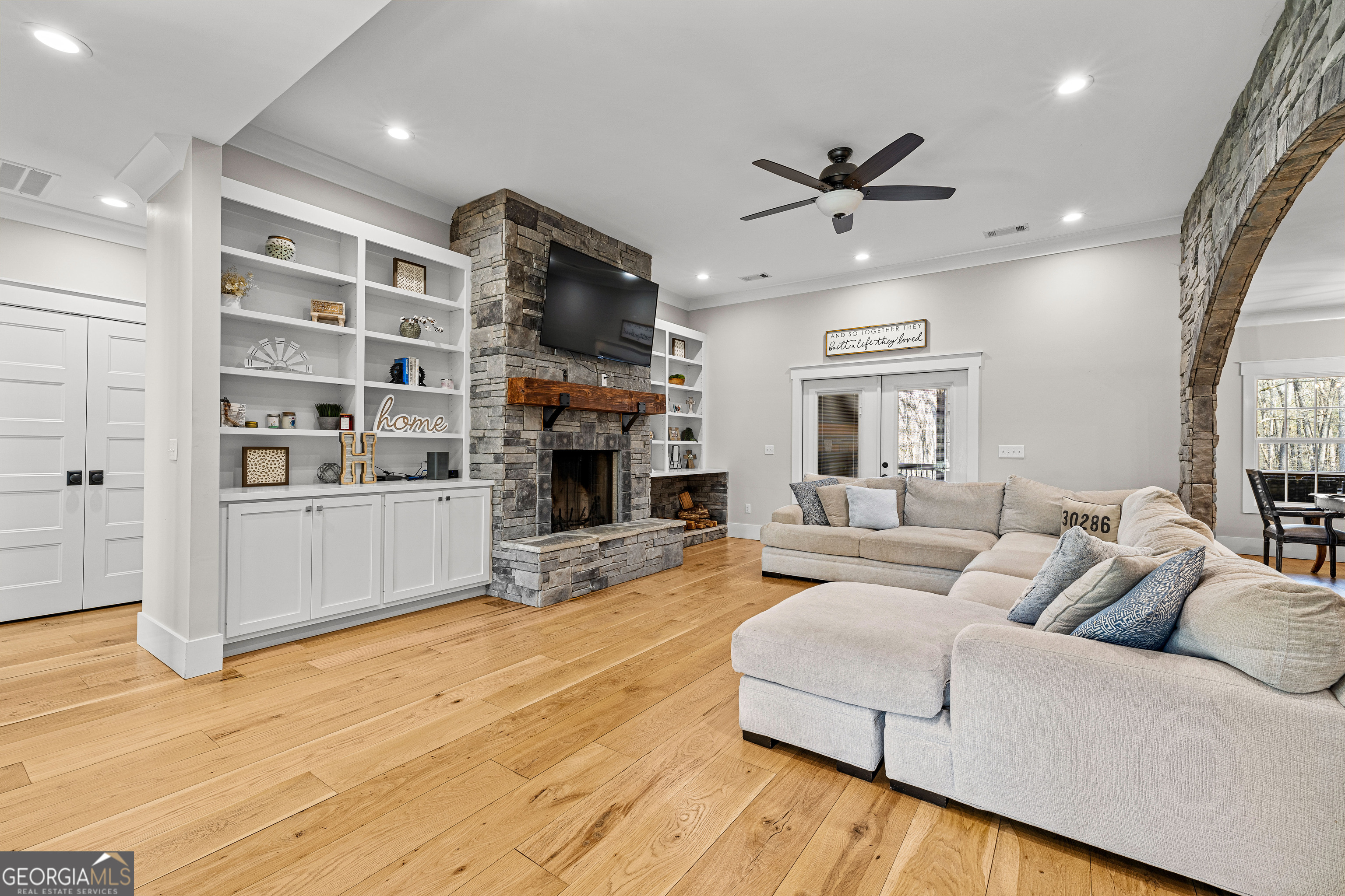 276 Davis Lake Road Thomaston, GA 30286 - Photo 16 of 108 a living room with furniture fireplace and a flat screen tv