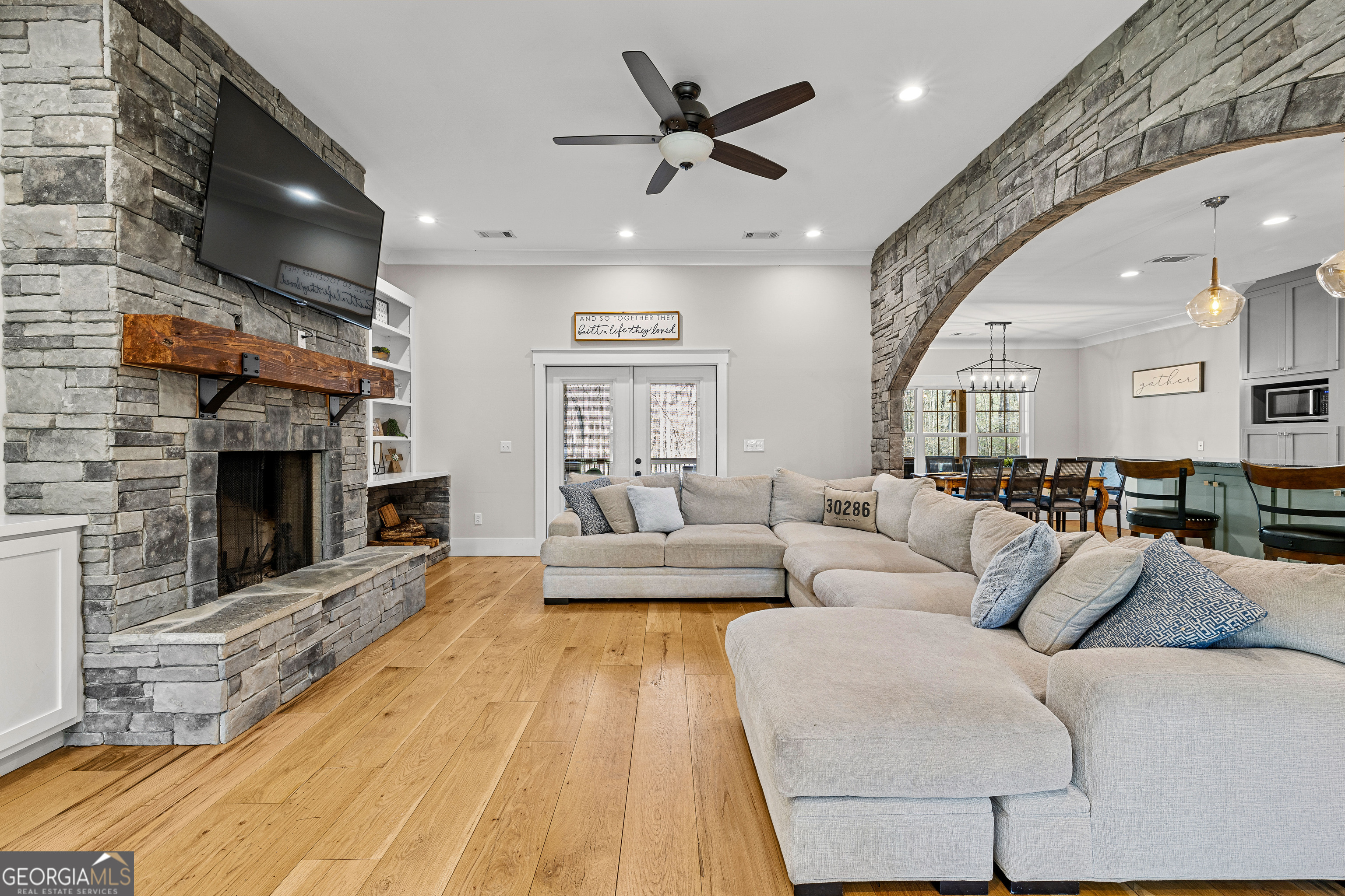 276 Davis Lake Road Thomaston, GA 30286 - Photo 17 of 108 a living room with furniture and a fireplace