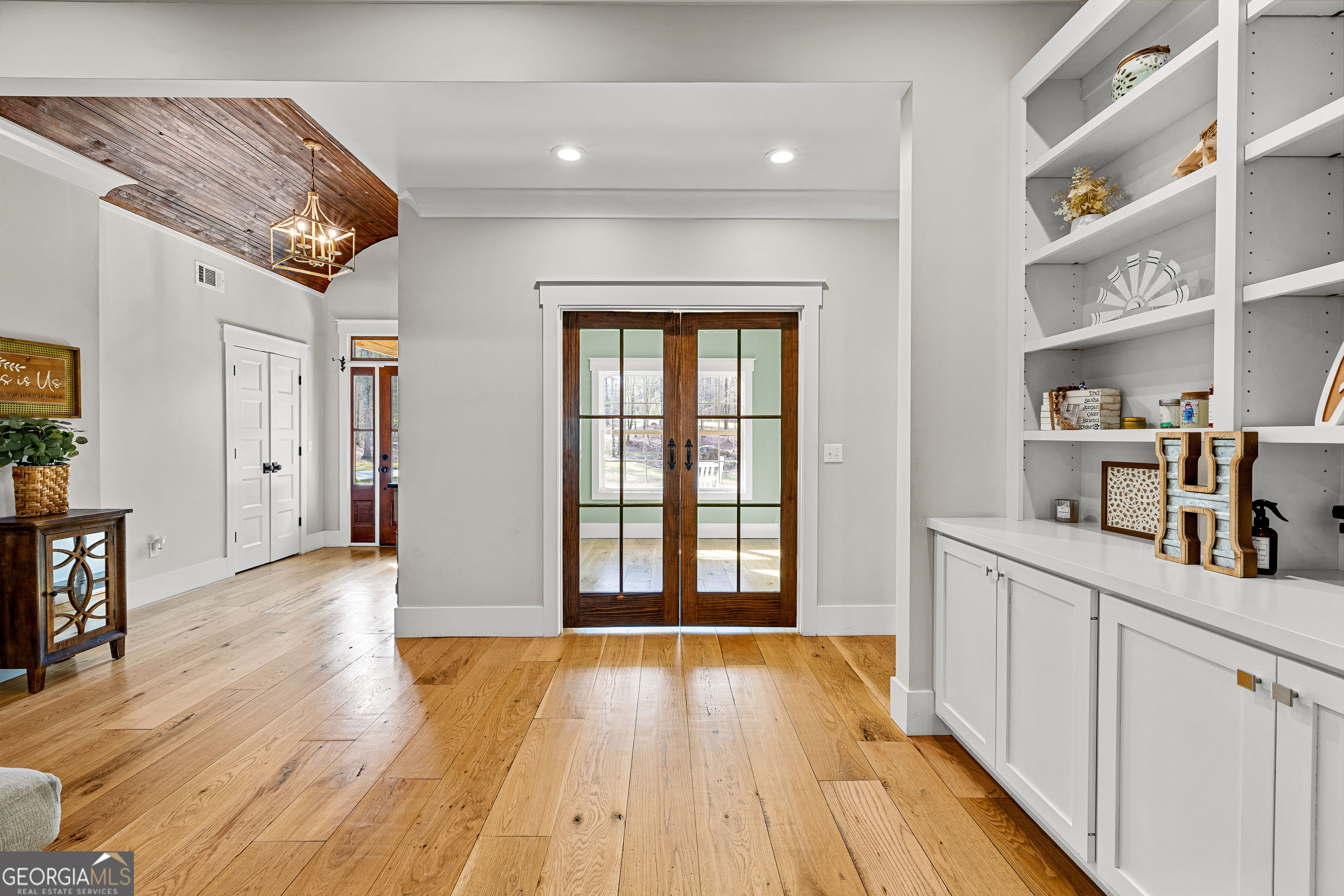276 Davis Lake Road Thomaston, GA 30286 - Photo 21 of 108 a view of a kitchen with cabinets and wooden floor