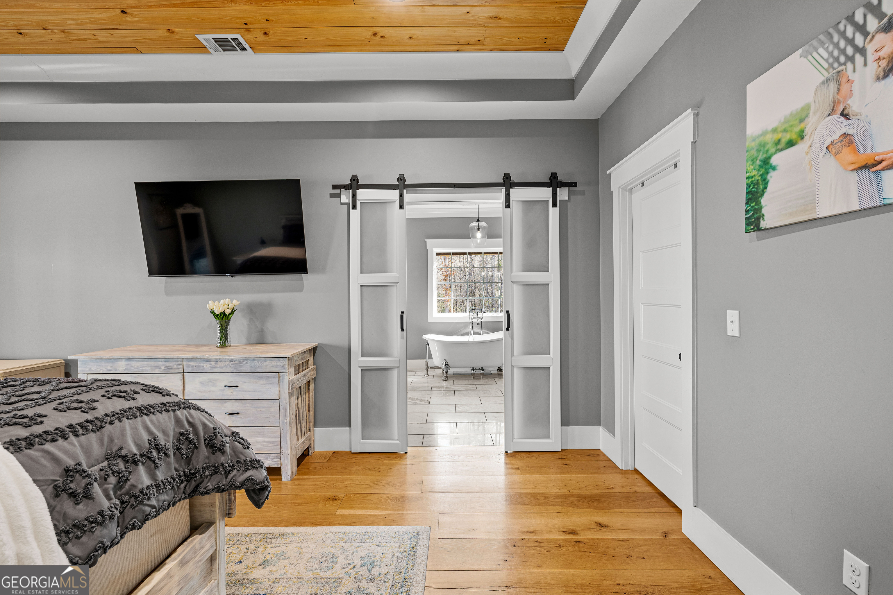 276 Davis Lake Road Thomaston, GA 30286 - Photo 45 of 108 a bedroom with a bed and a flat screen tv