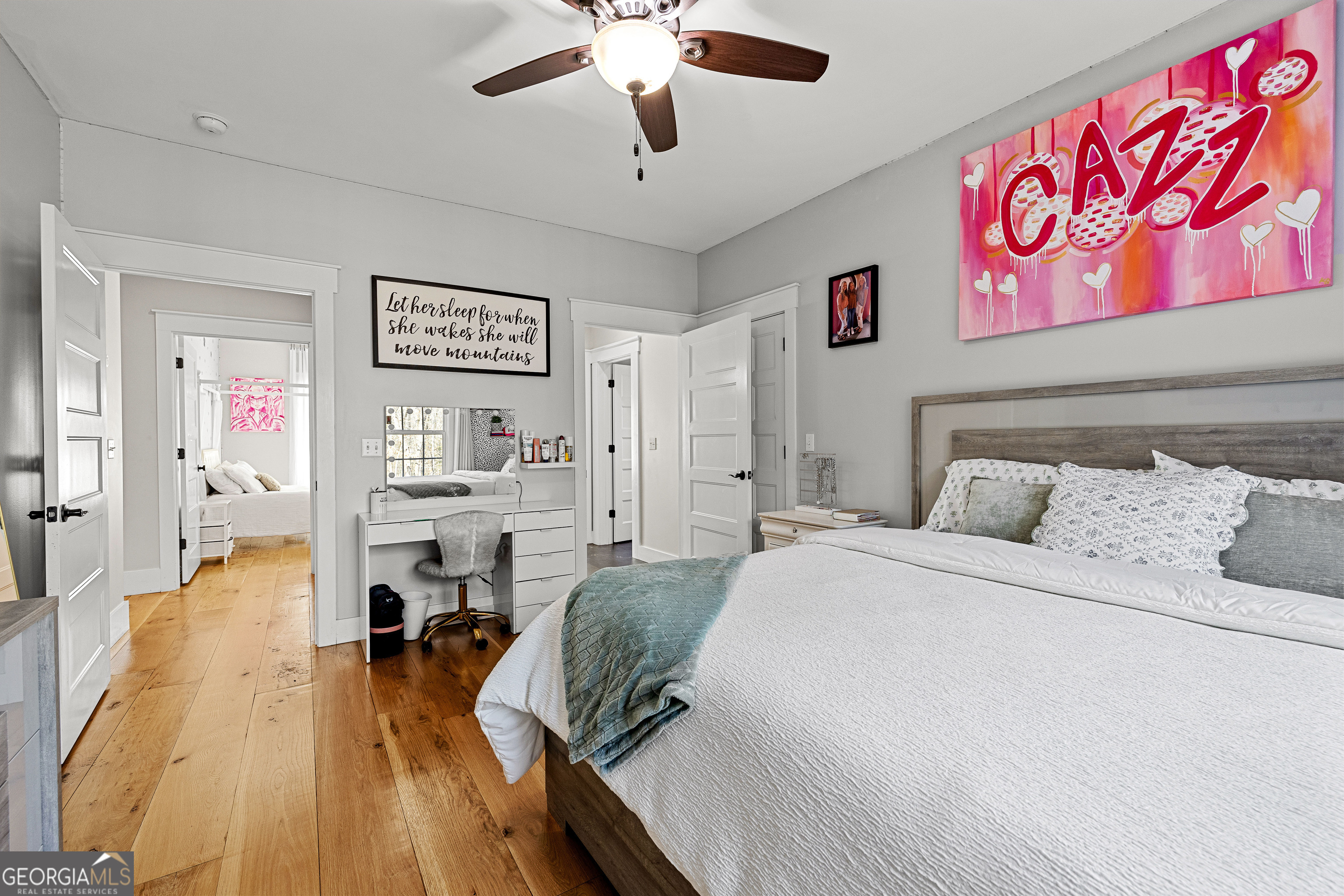 276 Davis Lake Road Thomaston, GA 30286 - Photo 61 of 108 a spacious bedroom with a bed and a view of kitchen
