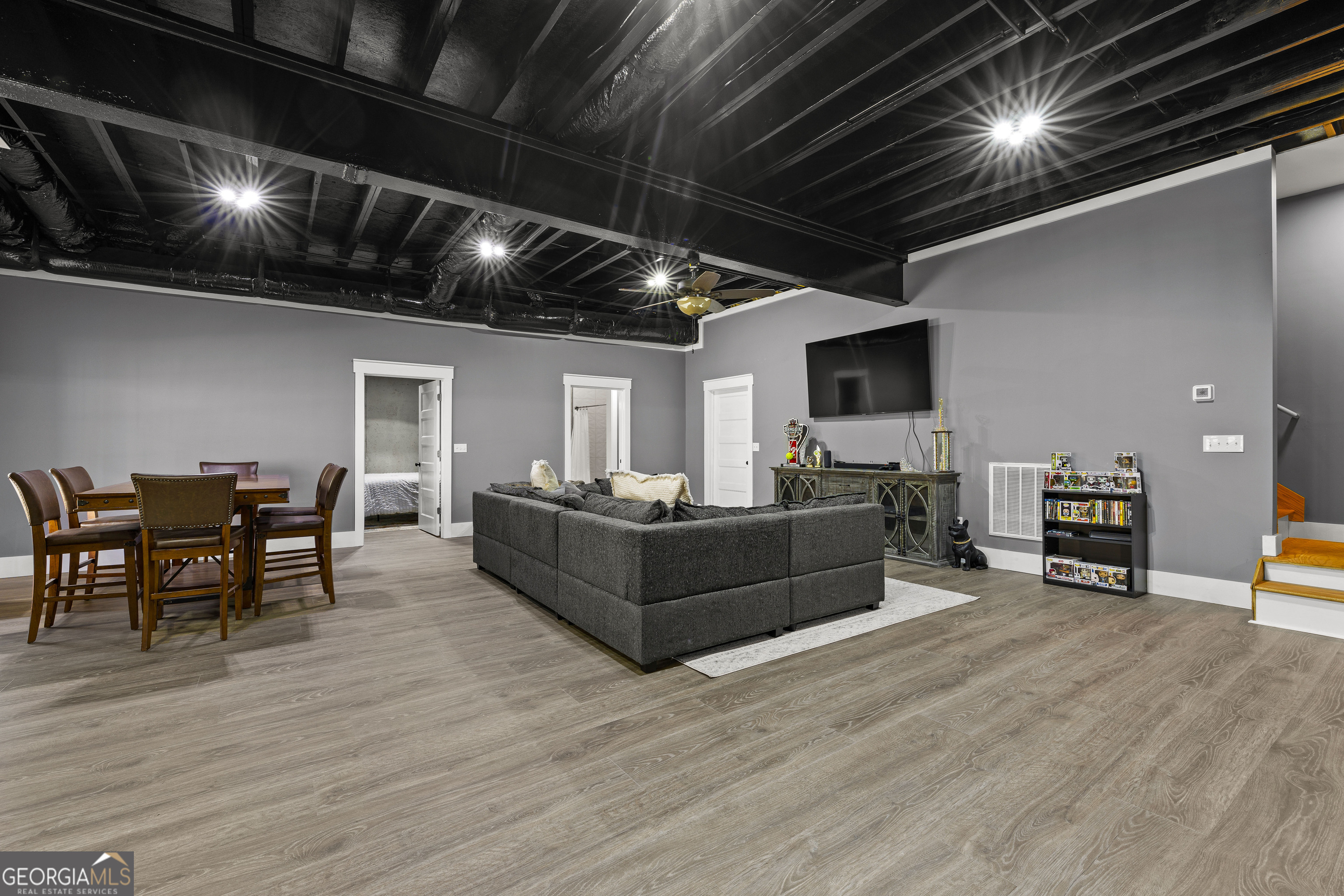 276 Davis Lake Road Thomaston, GA 30286 - Photo 65 of 108 a living room with furniture and a flat screen tv