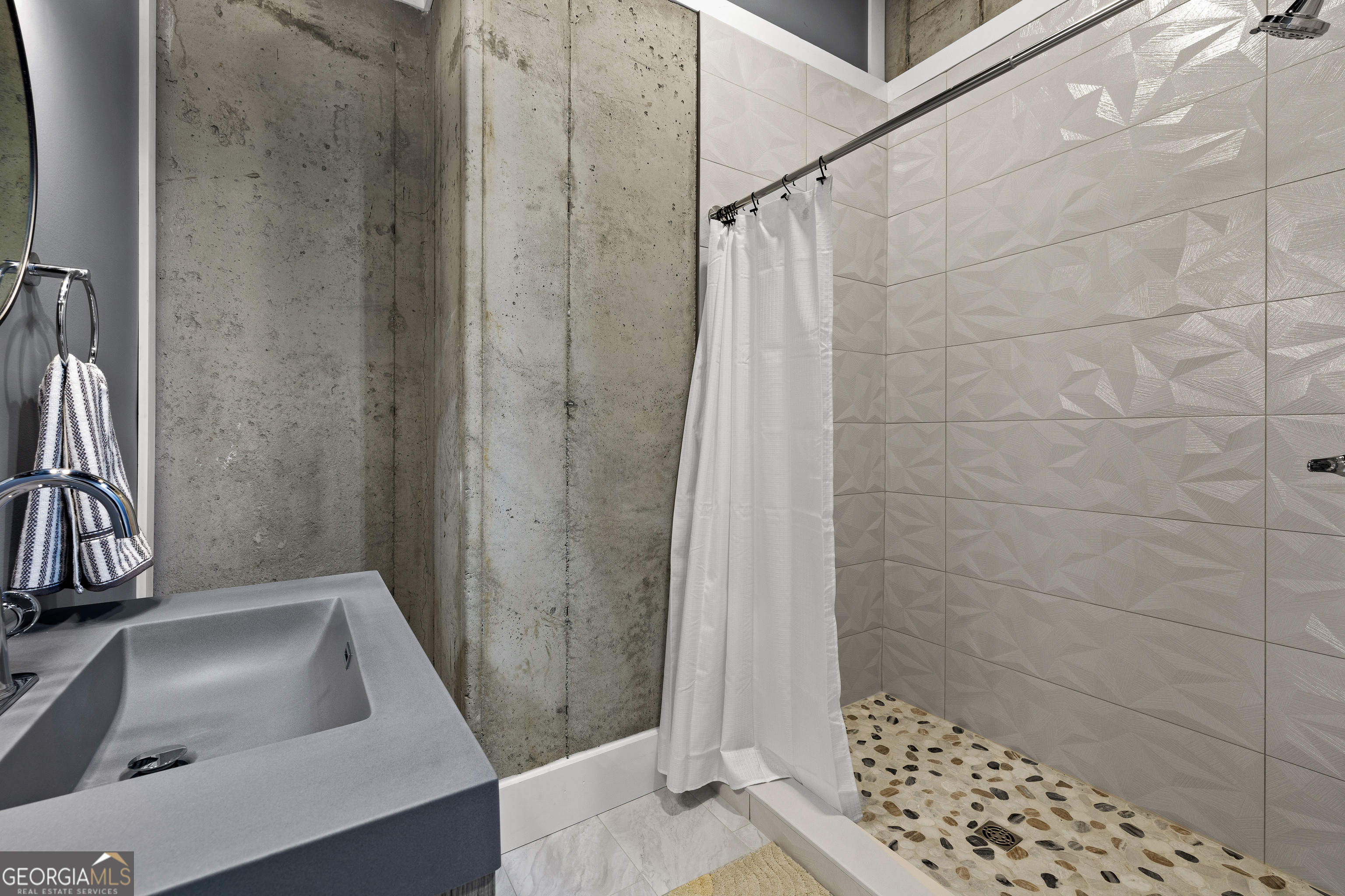 276 Davis Lake Road Thomaston, GA 30286 - Photo 71 of 108 a bathroom with a sink and shower