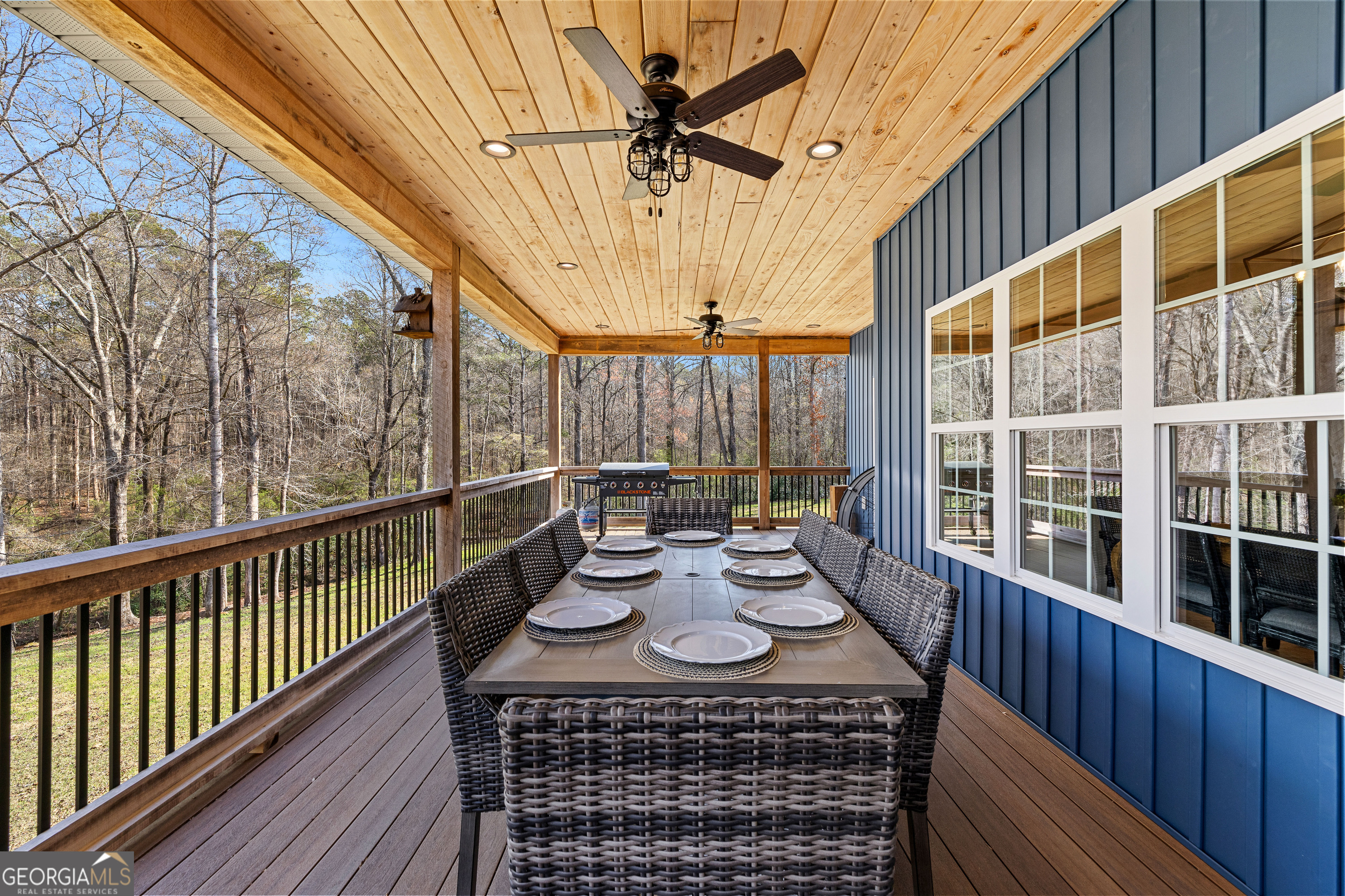 276 Davis Lake Road Thomaston, GA 30286 - Photo 94 of 108 a view of a balcony with chairs and wooden floor