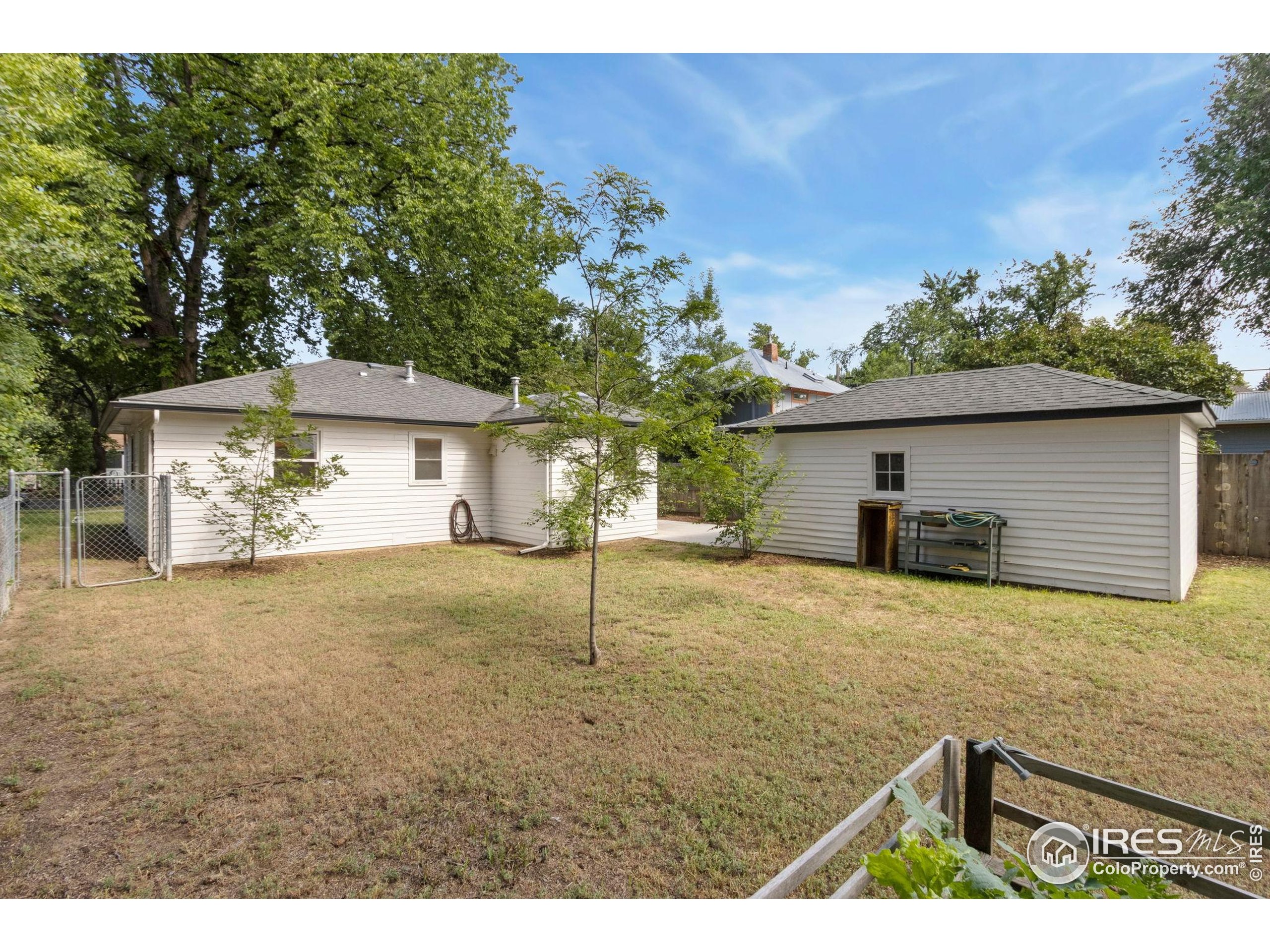 217 Park Street Fort Collins, CO 80521 - Photo 22 of 29 a house view with a backyard space