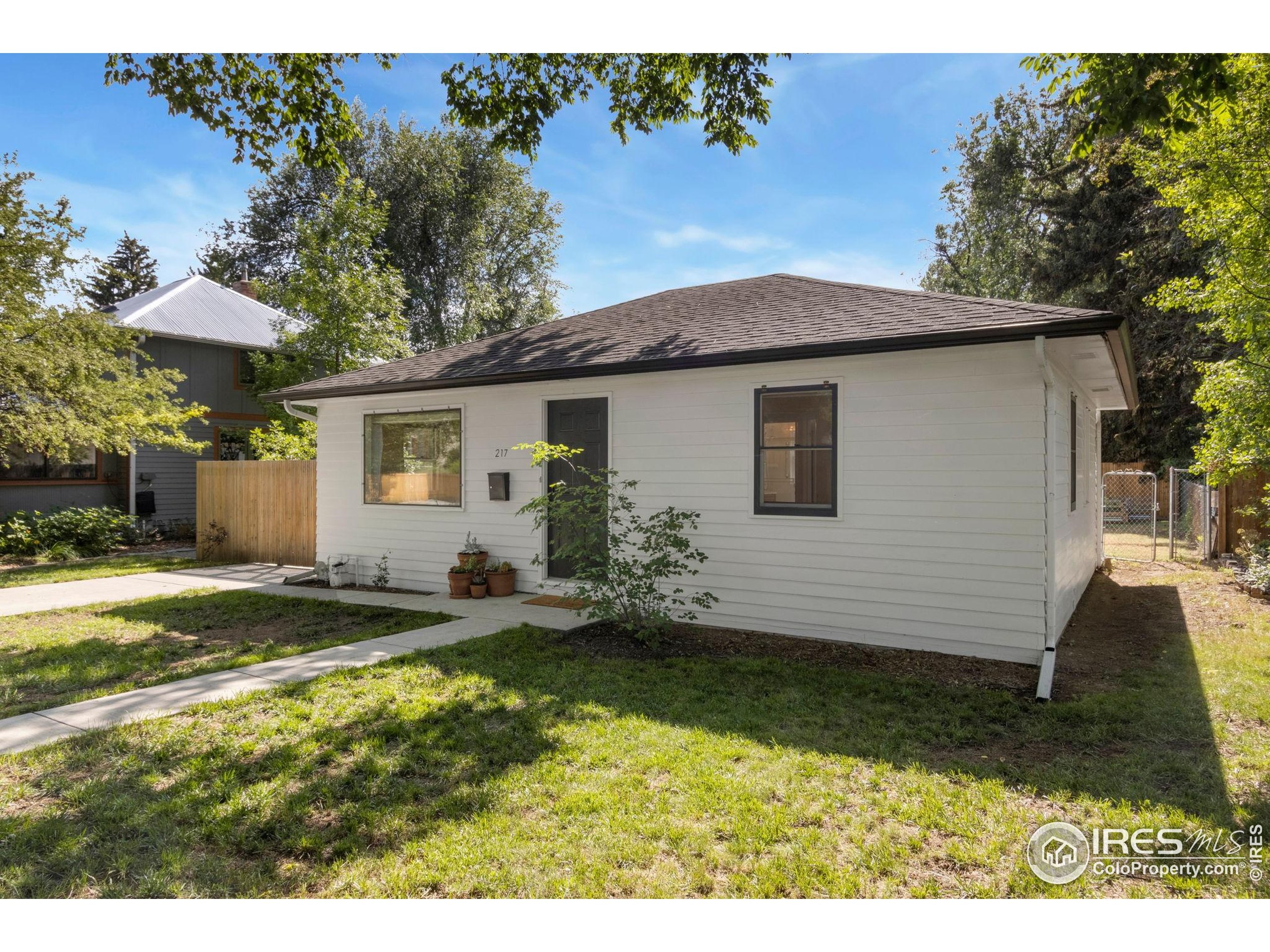 217 Park Street Fort Collins, CO 80521 - Photo 29 of 29 a view of a house with a yard