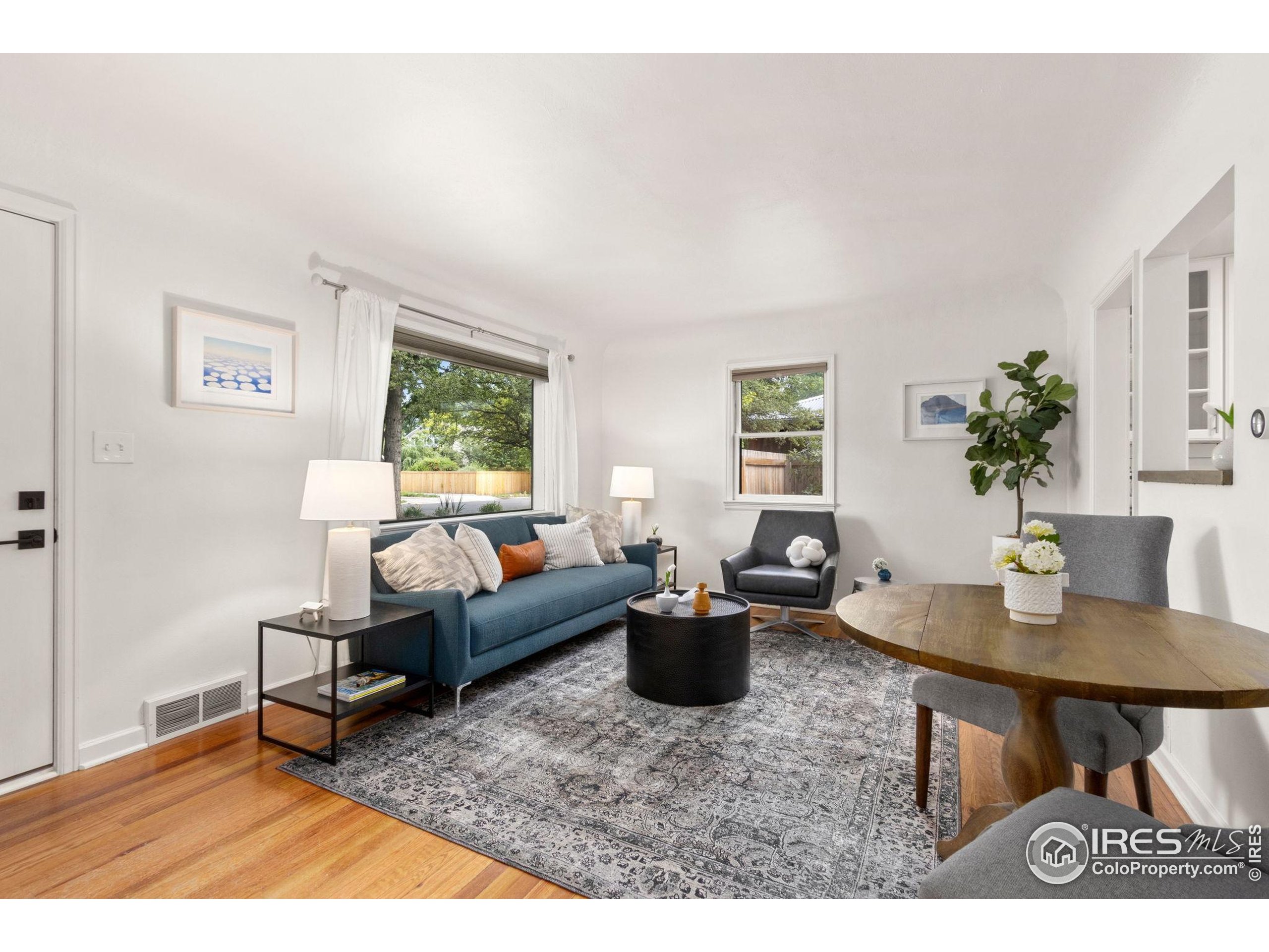 217 Park Street Fort Collins, CO 80521 - Photo 5 of 29 a living room with furniture a window and a table